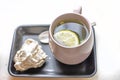 ginger tea with lemon and mint and nut meringue. Royalty Free Stock Photo
