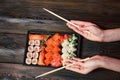 ginger wasabi sushi rolls on a wooden table delicacy sticks asian cuisine