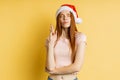 Beautiful caucasian female model wearing santa hat