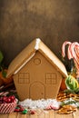 Gingerbead house ready to be decorated with candy