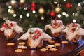 Gingerbread Christmas cookies  in the glass jar.  Christmas spices and decor close up. Festive background with bokeh and light. Royalty Free Stock Photo