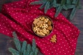 Gingerbread Christmas cookies in the iron box on red polka dot towel