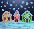 Gingerbread Christmas creamy house or dollhouse sweet pastry cookie hut on winter scene. Royalty Free Stock Photo