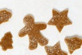 Gingerbread Cookie. New Year figure. Biscuits in form of Gingerbread man, Christmas tree, star, bell Royalty Free Stock Photo