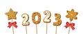 Gingerbread cookie numerals on sticks with phrase 2023 in cartoon style. Sweet biscuit star and snowflake in new year