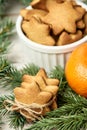 Gingerbread Cookie. Small stars. Delicious tangerine. NewYear. Fir branch Royalty Free Stock Photo