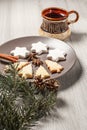 Gingerbread cookies in Christmas tree and star shape on plate Royalty Free Stock Photo