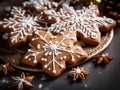 Gingerbread cookies close up. Christmas homemade gingerbread cookies on dark wooden table. Christmas banner with cookies glazed