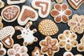 Gingerbread cookies in the form of a rabbit, flowers, hearts, grandmothers and Easter eggs, covered with white and chocolate icing Royalty Free Stock Photo