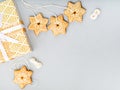 Gingerbread cookies and gift box Christmas background. Royalty Free Stock Photo