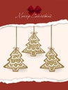 Gingerbread cookies hanging over Christmas card