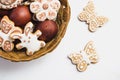 Gingerbread cookies in the shape of an Easter bunny, flowers and butterflies, covered with white and chocolate icing-sugar, and Ea Royalty Free Stock Photo