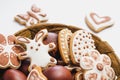 Gingerbread cookies in the shape of an Easter bunny, flowers, butterflies and hearts, covered with white and chocolate icing-sugar Royalty Free Stock Photo