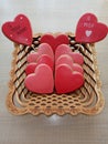 Gingerbread cookies in the shape of hearts. Bright hearts in wooden dishes. A gift for your loved ones