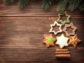 Gingerbread cookies stacked as christmas tree.