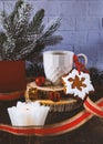 Gingerbread, a cup of coffee and a candle. Festive Christmas and New Year composition with New Year\'s decor.
