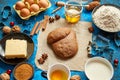 Gingerbread dough placed among various ingredients. Christmas baking concept