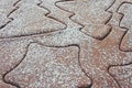 Gingerbread dough, rolled out with different Christmas shapes cut into it Royalty Free Stock Photo