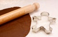 Gingerbread dough, rolling pin and cookie cutter Royalty Free Stock Photo