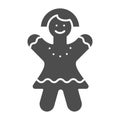 Gingerbread girl solid icon. Christmas cookie vector illustration isolated on white. Biscuit glyph style design