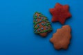 GingerbreadDelicious gingerbread cookies for christmas on blue background