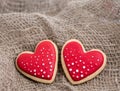 Gingerbread heart cookies on a rustic wooden background. Valentine`s Day concpt. Free space copyspase for your text