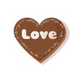 Gingerbread heart cookies for Valentine's Day. Chocolate gingerbread heart decorated with sprinkles and inscription