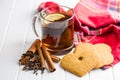 Gingerbread heart shape and cup of tea. Royalty Free Stock Photo