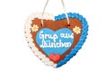 Gingerbread heart with written slogan: Greetings from Munich, Bavarian symbol and Munich landmark, Gingerbread candy isolated on
