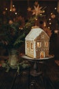 Gingerbread house handmade on dark Christmas background