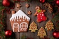 Gingerbread house, man, stars and fir trees Royalty Free Stock Photo