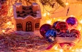 Gingerbread houses under Christmas tree. Christmas decor. 2020 New year Royalty Free Stock Photo