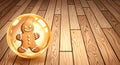 Gingerbread Man in a Bubble on a Wooden Floor - Festive Holiday Charm Royalty Free Stock Photo