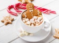 Gingerbread man in Christmas hot chocolate cup