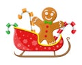 Gingerbread man cookie candycane in santa sleigh Royalty Free Stock Photo