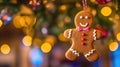 Gingerbread Man Cookie in Christmas Tree with Bokeh Lights. Festive Decoration and Closeup Magic for New Year