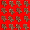 Gingerbread man cookie pattern on a red background