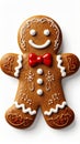 Gingerbread Man Cookie with White Icing and Red Bow Tie on White Royalty Free Stock Photo