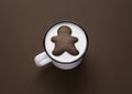 Gingerbread man inside milk cup. Milk and cookies. Xmas sweets