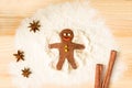 Gingerbread man making a snow angel on flour. Royalty Free Stock Photo