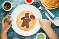 Gingerbread man pancake. Sweet pancake with chocolate and sugar