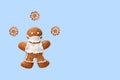Gingerbread man with protective face mask and coronaviruses Royalty Free Stock Photo