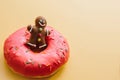 Gingerbread man resting in a donut. Creative idea. Celebratory concept