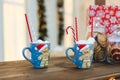 Gingerbread Man with two blue cups - Christmas Holiday Background Royalty Free Stock Photo