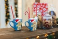 Gingerbread Man with two blue cups - Christmas Holiday Breakfast Background Royalty Free Stock Photo