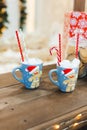 Gingerbread Man with two blue cups - Christmas Holiday Breakfast Background Royalty Free Stock Photo