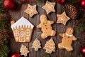 Gingerbread man and woman, house, fir trees, stars Royalty Free Stock Photo