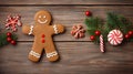 Gingerbread man on wooden background on Happy Christmas time.