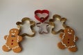 Cookie cutters hearts and gingerbread Royalty Free Stock Photo