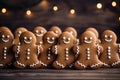 Gingerbread men homemade cookies standing on festive background. Christmas pastries. AI generated Royalty Free Stock Photo